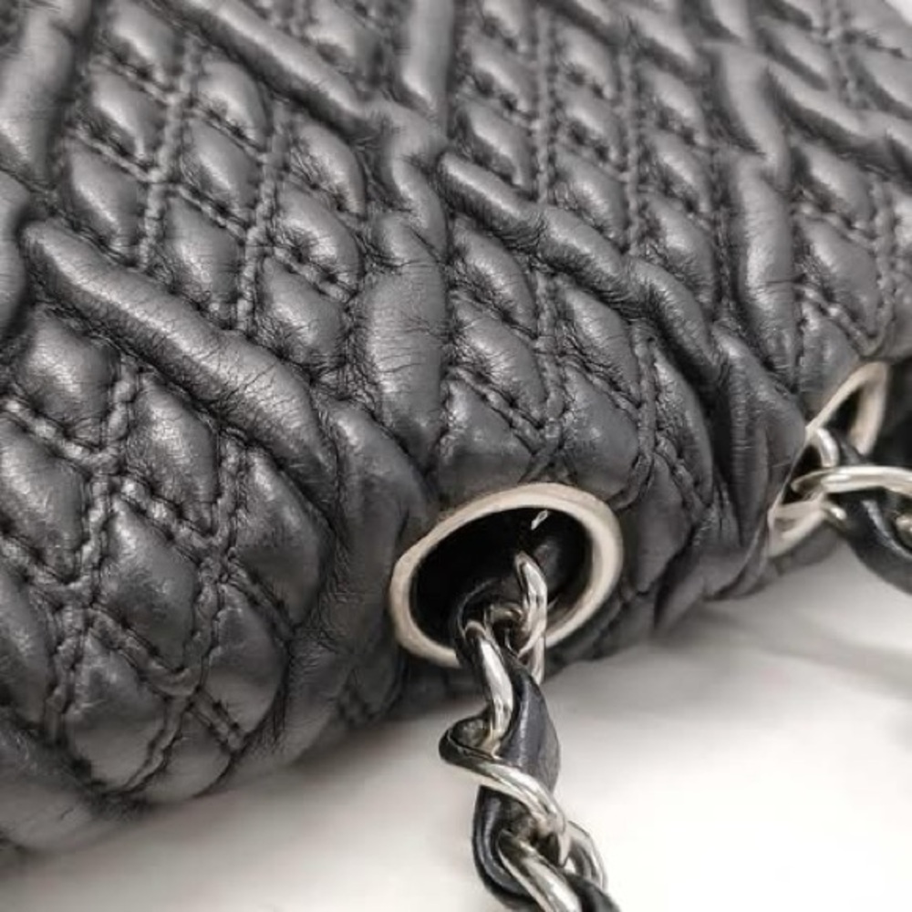 Chanel - Black Quilted Flap Diamond Stitch
c: Early 2000s - Picture 3 of 4
